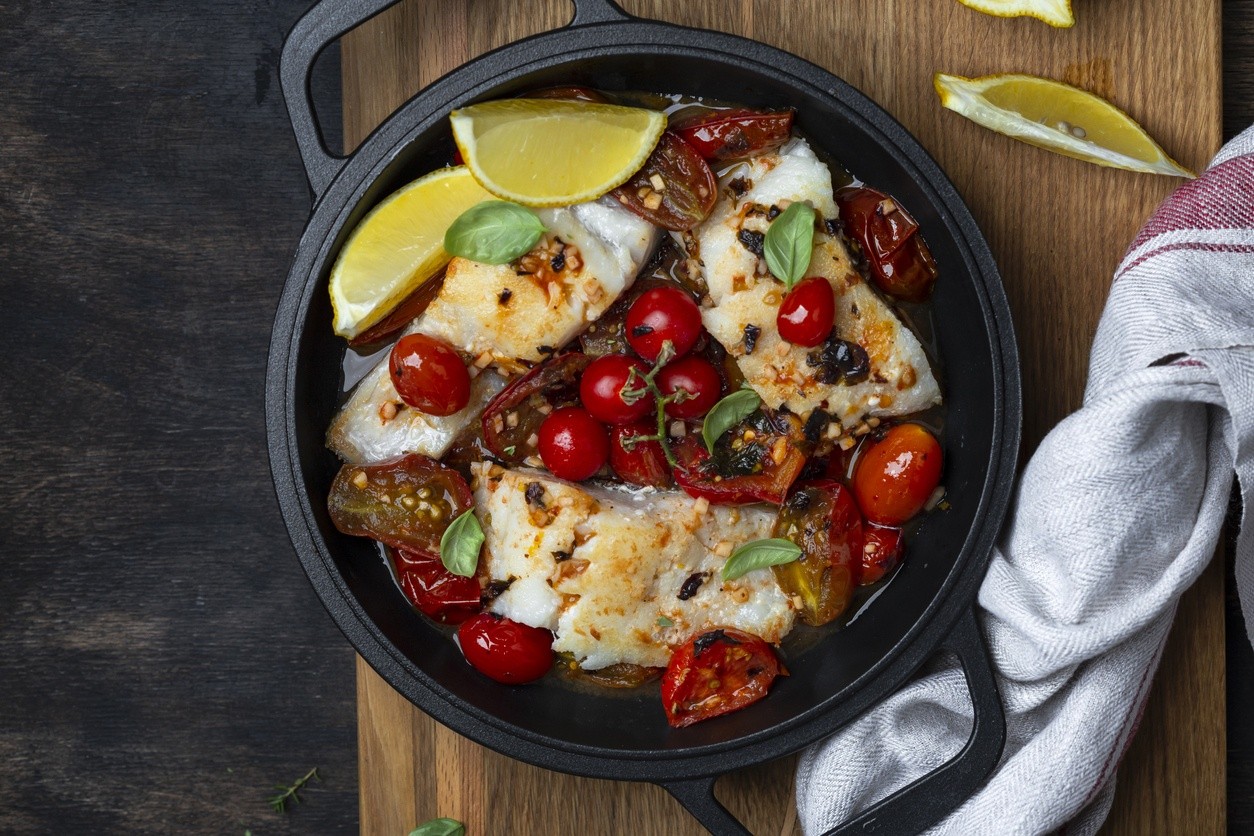 Baccalà con pomodori al forno
