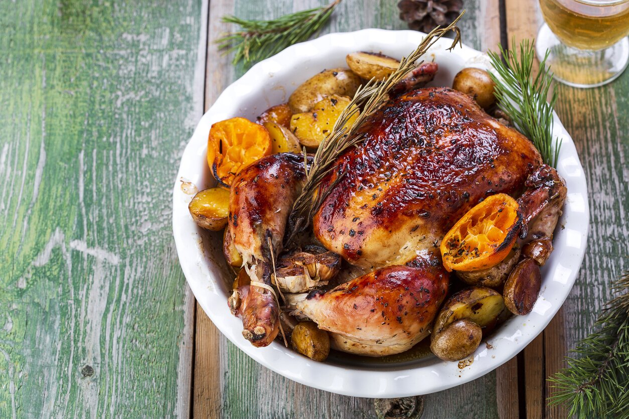 Pollo con patate e arancia